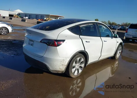2023 Tesla Model Y Rwd from USA, damaged, VIN 7SAYGDED9PF942211